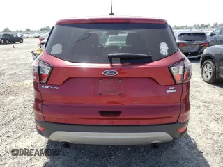 2017 Ford Escape SE with VIN 1FMCU0GD0HUC90038, listed as a Copart auction lot 54340005 with 115,717 mi miles and Clean Title. Bid and sale history available at DreamBid. Image 6.