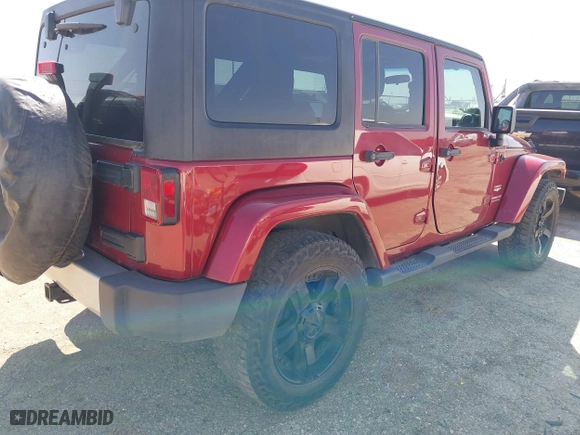 2011 Jeep Wrangler Unlimited Sahara with VIN 1J4BA5H15BL557871, listed as a IAAI auction lot 41922328 with 206,581 mi miles. Bid and sale history available at carsss.com. Image 4.