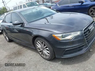 2014 Audi A6 Prestige with VIN WAUHGBFC2EN115704, listed as a IAAI auction lot 42233651 with 140,079 mi miles and . Bid and sale history available at DreamBid. Image 1.