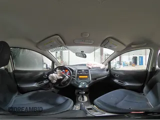 2014 Nissan Note S z VIN 3N1CE2CP2EL396903, wystawiony jako Copart lot #55398645 z przebiegiem 72 067 mil mil oraz Szkoda całkowita • Salvage title. Historia ofert i sprzedaży dostępna na DreamBid. Obrazek 14.