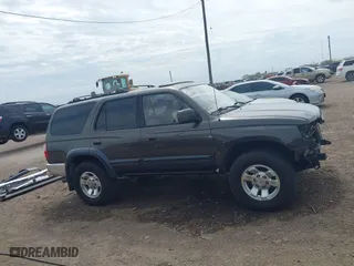 1998 Toyota 4Runner with VIN JT3GN87R9W0059225, listed as a IAAI auction lot 41669661 with 241,986 mi miles. Bid and sale history available at carsss.com. Image 14.
