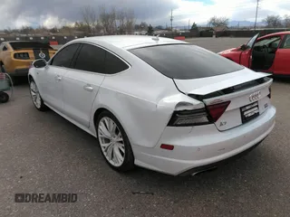 2016 Audi A7 3.0 Premium Plus with VIN WAUWGAFC6GN144188, listed as a IAAI auction lot 41824927 with 128,379 mi miles. Bid and sale history available at carsss.com. Image 3.