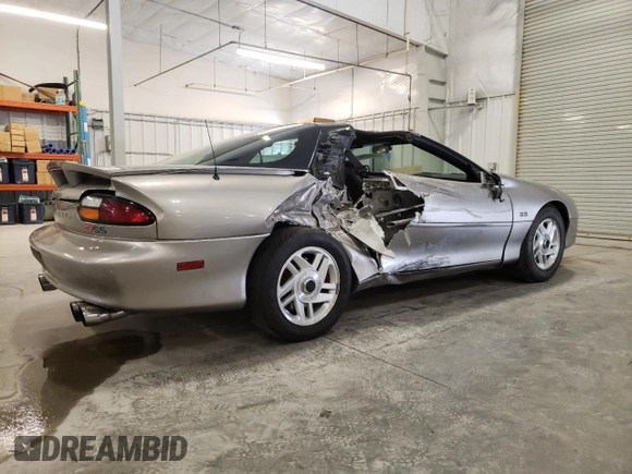 2001 Chevrolet Camaro Z28 z VIN 2G1FP22GX12112874, wystawiony jako Copart lot #70669594 z przebiegiem 58 773 mil mil oraz Szkoda całkowita • Salvage title. Historia ofert i sprzedaży dostępna na DreamBid. Obrazek 3.