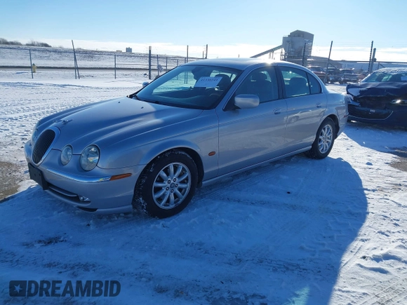 2001 Jaguar S-Type with VIN SAJDA01P11GM20659, listed as a IAAI auction lot 41330249 with 146,309 mi miles and . Bid and sale history available at DreamBid. Image 2.