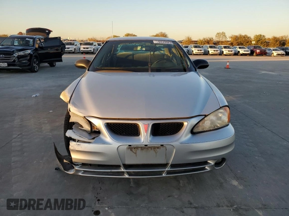 2004 Pontiac Grand Am SE1 with VIN 1G2NF52E44M557796, listed as a Copart auction lot 84399234 with 99,241 mi miles and Salvage Title. Bid and sale history available at carsss.com. Image 5.