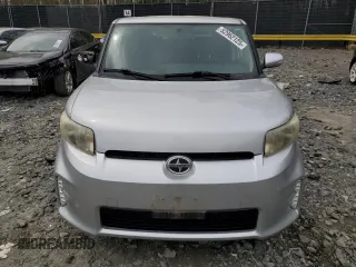 2014 Scion xB with VIN JTLZE4FE0EJ049899, listed as a Copart auction lot 52962125 with 120,791 mi miles and Salvage Title. Bid and sale history available at carsss.com. Image 5.