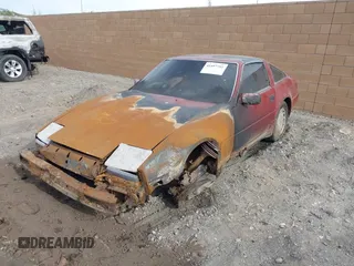 1988 Nissan 300ZX z VIN JN1HZ14S0JX271792, wystawiony jako IAAI lot #41457761 z przebiegiem Nie podano mil oraz . Historia ofert i sprzedaży dostępna na DreamBid. Obrazek 2.