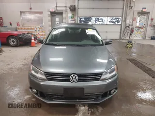 2014 Volkswagen Jetta TDI w/Premium with VIN 3VWLL7AJ4EM425825, listed as a IAAI auction lot 41519621 with 154,486 mi miles and . Bid and sale history available at DreamBid. Image 12.