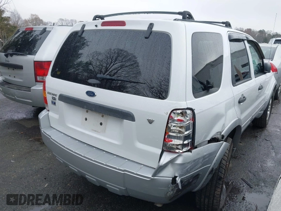2007 Ford Escape XLT with VIN 1FMYU03197KB80133, listed as a IAAI auction lot 41084715 with 185,132 mi miles and . Bid and sale history available at DreamBid. Image 4.