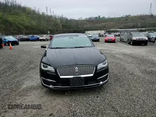 2017 Lincoln MKZ Reserve z VIN 3LN6L5F97HR653498, wystawiony jako Copart lot #52730055 z przebiegiem 95 005 mil mil oraz Szkoda całkowita • Salvage title. Historia ofert i sprzedaży dostępna na DreamBid. Obrazek 11.