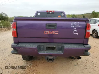 2017 GMC Sierra 2500HD Denali z VIN 1GT12UEG4HF127967, wystawiony jako Copart lot #51812665 z przebiegiem Nie podano mil oraz Szkody całkowita. Historia ofert i sprzedaży dostępna na DreamBid. Obrazek 6.