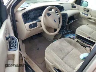 2003 Ford Windstar LX z VIN 2FMZA51423BA92083, wystawiony jako Copart lot #75399354 z przebiegiem Nie podano mil oraz Szkoda całkowita • Salvage title. Historia ofert i sprzedaży dostępna na DreamBid. Obrazek 8.