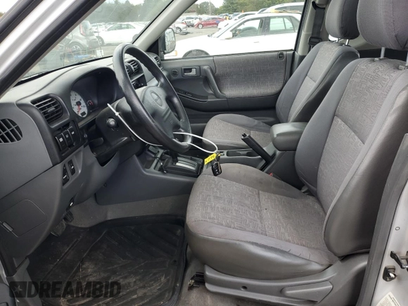 2002 Isuzu Rodeo with VIN 4S2CM57W024315499, listed as a Copart auction lot 75885194 with 183,425 mi miles and Salvage title. Bid and sale history available at DreamBid. Image 7.
