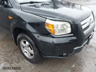 2006 Honda Pilot EX with VIN 2HKYF18486H527682, listed as a IAAI auction lot 41941295 with 235,521 mi miles. Bid and sale history available at carsss.com. Image 6.