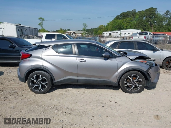2018 Toyota C-HR XLE with VIN NMTKHMBX1JR026901, listed as a IAAI auction lot 42021943 with 78,217 mi miles and . Bid and sale history available at DreamBid. Image 13.