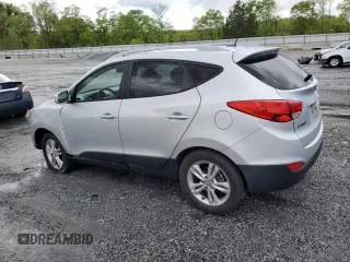 2013 Hyundai Tucson GLS with VIN KM8JU3AC1DU709937, listed as a Copart auction lot 52716295 with 181,711 mi miles and Salvage Title. Bid and sale history available at carsss.com. Image 2.
