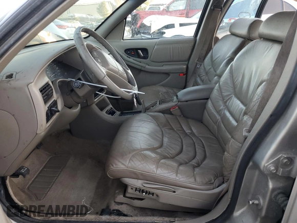 1996 Buick Regal Custom with VIN 2G4WB52K5T1517380, listed as a Copart auction lot 83106314 with 112,411 mi miles and Salvage title. Bid and sale history available at DreamBid. Image 7.