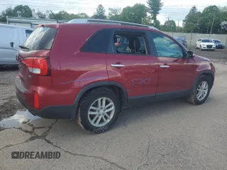 2014 Kia Sorento LX z VIN 5XYKT3A6XEG449692, wystawiony jako Copart lot #55324885 z przebiegiem 103 809 mil mil oraz Szkoda całkowita • Salvage title. Historia ofert i sprzedaży dostępna na DreamBid. Obrazek 3.