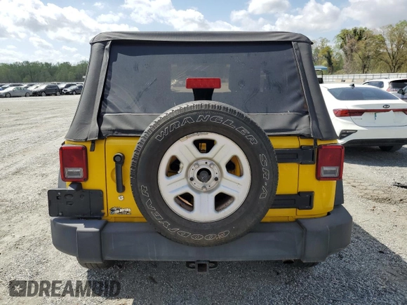 2009 Jeep Wrangler X with VIN 1J4FA241X9L765664, listed as a Copart auction lot 51802065 with 137,053 mi miles and Salvage Title. Bid and sale history available at DreamBid. Image 6.