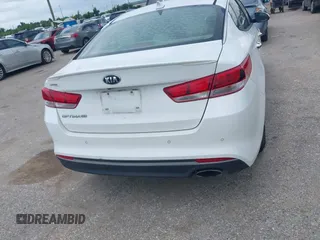 2018 Kia Optima S with VIN 5XXGT4L32JG184893, listed as a IAAI auction lot 42680521 with 55,225 mi miles and . Bid and sale history available at DreamBid. Image 16.