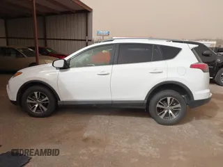 2018 Toyota RAV4 XLE with VIN JTMWFREV2JJ730568, listed as a IAAI auction lot 41814302 with 108,622 mi miles and . Bid and sale history available at DreamBid. Image 13.