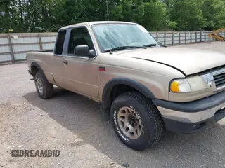 1999 Mazda B-Series Truck SE z VIN 4F4ZR17X5XTM13263, wystawiony jako IAAI lot #42431025 z przebiegiem 246 395 mil mil oraz . Historia ofert i sprzedaży dostępna na DreamBid. Obrazek 1.