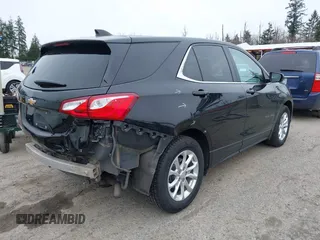 2020 Chevrolet Equinox LT z VIN 2GNAXKEV5L6142198, wystawiony jako IAAI lot #41765650 z przebiegiem 131 946 mil mil oraz . Historia ofert i sprzedaży dostępna na DreamBid. Obrazek 4.