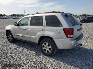 2009 Jeep Grand Cherokee Laredo with VIN 1J8GR48K09C551423, listed as a Copart auction lot 54094465 with 163,263 mi miles and Clean Title. Bid and sale history available at carsss.com. Image 2.