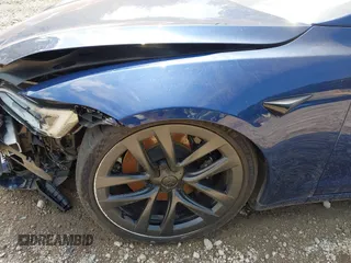 2022 Tesla Model S with VIN 5YJSA1E55NF486443, listed as a IAAI auction lot 42720110 with Not provided miles and . Bid and sale history available at DreamBid. Image 21.