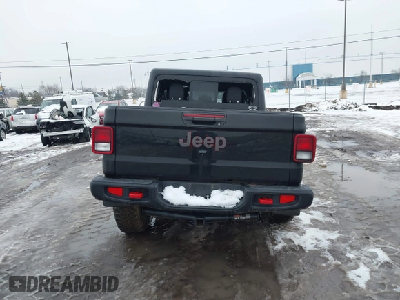 2021 Jeep Gladiator Rubicon z VIN 1C6JJTBG5ML605799, wystawiony jako IAAI lot #41190679 z przebiegiem 47 550 mil mil oraz . Historia ofert i sprzedaży dostępna na DreamBid. Obrazek 16.