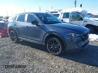 2024 Mazda CX-5 2.5 S Carbon Edition with VIN JM3KFBCM7R0370156, listed as a IAAI auction lot 41430060 with 4,999 mi miles. Bid and sale history available at carsss.com. Image 1.