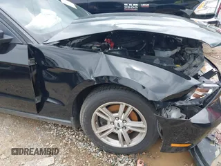 2012 Ford Mustang Premium with VIN 1ZVBP8AM4C5285696, listed as a IAAI auction lot 42465296 with 143,387 mi miles and . Bid and sale history available at DreamBid. Image 22.
