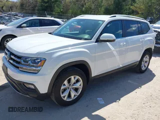 2018 Volkswagen Atlas SE with VIN 1V2KR2CAXJC586848, listed as a IAAI auction lot 42200959 with 96,336 mi miles and . Bid and sale history available at DreamBid. Image 2.