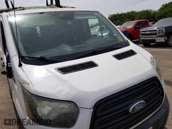 2016 Ford Transit Cargo with VIN 1FTYE1YM6GKB52123, listed as a IAAI auction lot 42168794 with 218,592 mi miles. Bid and sale history available at carsss.com. Image 1.
