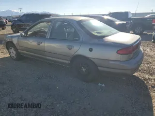 1998 Ford Contour z VIN 1FAFP66Z5WK232756, wystawiony jako Copart lot #86648364 z przebiegiem 118 176 mil mil oraz Tytuł czysty. Historia ofert i sprzedaży dostępna na DreamBid. Obrazek 2.