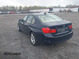 2015 BMW 3 Series 320i xDrive with VIN WBA3C3G5XFNT51305, listed as a IAAI auction lot 42023280 with 127,887 mi miles and . Bid and sale history available at DreamBid. Image 3.