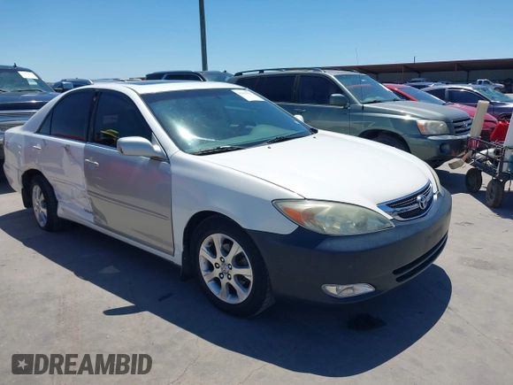 2004 Toyota Camry LE with VIN JTDBE32K840277463, listed as a IAAI auction lot 42080523 with 139,558 mi miles. Bid and sale history available at carsss.com. Image 1.