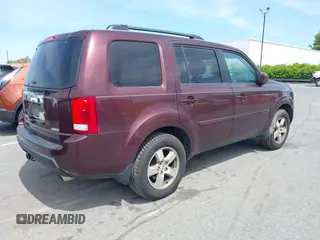2011 Honda Pilot EX-L with VIN 5FNYF4H59BB090116, listed as a IAAI auction lot 42048811 with 158,857 mi miles and . Bid and sale history available at carsss.com. Image 4.