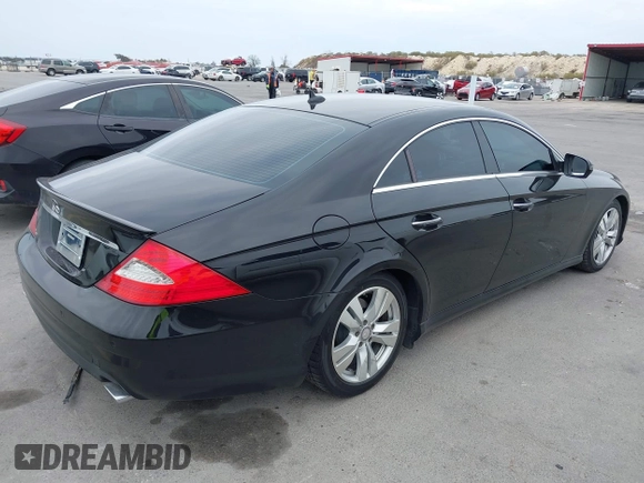 2009 Mercedes-Benz CLS-Class 5.5L with VIN WDDDJ72X99A141289, listed as a IAAI auction lot 41436528 with 126,649 mi miles. Bid and sale history available at carsss.com. Image 4.
