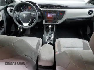 2019 Toyota Corolla L z VIN 5YFBURHE6KP870832, wystawiony jako Copart lot #57884205 z przebiegiem 132 860 mil mil oraz Szkoda całkowita • Salvage title. Historia ofert i sprzedaży dostępna na DreamBid. Obrazek 8.