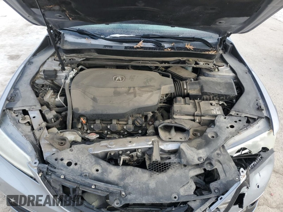 2015 Acura TLX Advance z VIN 19UUB3F77FA005007, wystawiony jako Copart lot #87959515 z przebiegiem 112 210 mil mil oraz Szkoda całkowita • Salvage title. Historia ofert i sprzedaży dostępna na DreamBid. Obrazek 11.