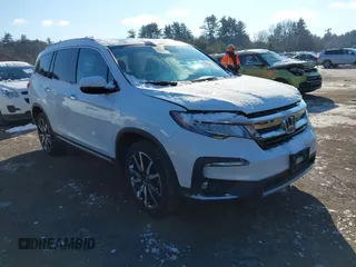 2020 Honda Pilot Elite with VIN 5FNYF6H09LB039247, listed as a IAAI auction lot 41364383 with 56,865 mi miles and . Bid and sale history available at DreamBid. Image 1.