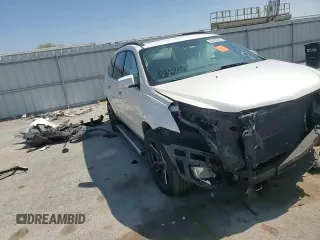 2012 Chevrolet Traverse LTZ z VIN 1GNKVLED1CJ170106, wystawiony jako Copart lot #52022235 z przebiegiem Nie podano mil oraz Szkoda całkowita • Salvage title. Historia ofert i sprzedaży dostępna na DreamBid. Obrazek 12.