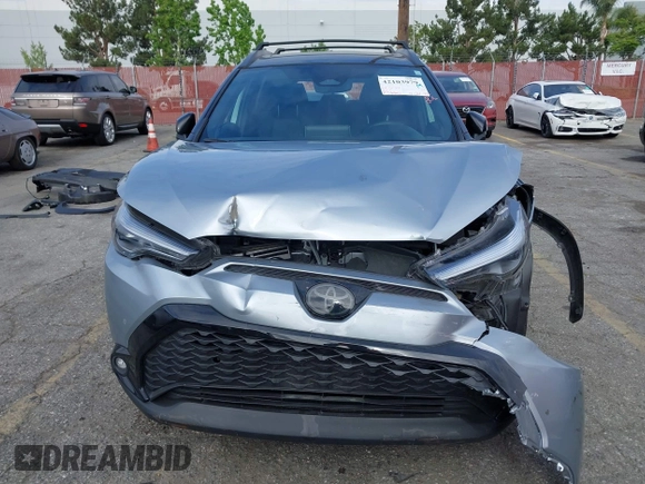 2024 Toyota Corolla Cross Hybrid S with VIN 7MUFBABG2RV030377, listed as a IAAI auction lot 42103979 with 15,660 mi miles and . Bid and sale history available at DreamBid. Image 18.