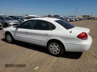2006 Ford Taurus SE with VIN 1FAFP53UX6A194398, listed as a Copart auction lot 59582515 with 114,933 mi miles and Salvage title. Bid and sale history available at DreamBid. Image 2.