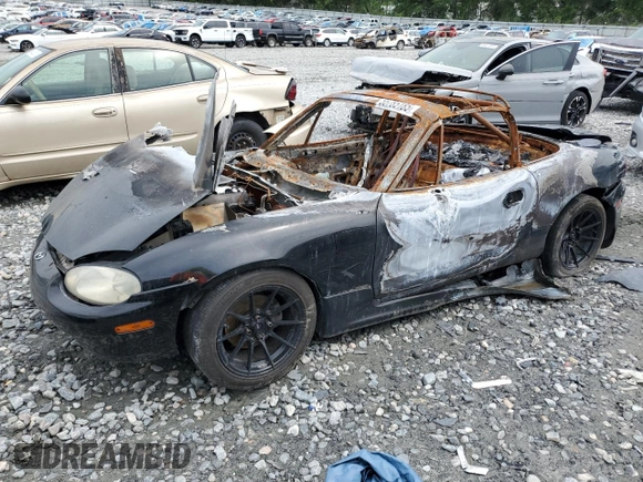 1999 Mazda MX-5 Miata z VIN JM1NB3535X0131701, wystawiony jako Copart lot #55785185 z przebiegiem Nie podano mil oraz Nie do naprawy • Non repairable. Historia ofert i sprzedaży dostępna na DreamBid. Obrazek 1.