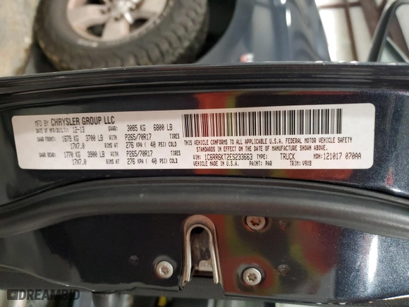 2014 Ram 1500 Tradesman with VIN 1C6RR6KT2ES233663, listed as a Copart auction lot 45344725 with 102,289 mi miles and Salvage Title. Bid and sale history available at carsss.com. Image 13.