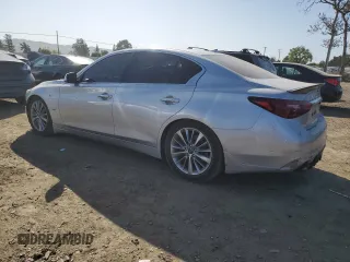 2019 Infiniti Q50 Luxe z VIN JN1EV7AP4KM543474, wystawiony jako Copart lot #52426585 z przebiegiem 50 435 mil mil oraz Szkoda całkowita • Salvage title. Historia ofert i sprzedaży dostępna na DreamBid. Obrazek 2.