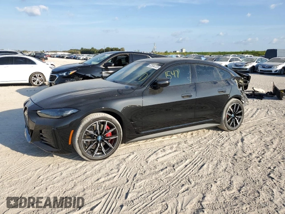 2023 BMW i4 eDrive40 z VIN WBY73AW07PFP07184, wystawiony jako Copart lot #42594723 z przebiegiem 1 547 mil mil oraz . Historia ofert i sprzedaży dostępna na DreamBid. Obrazek 1.