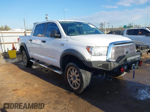2012 Toyota Tundra 4WD Truck with VIN 5TFDW5F10CX241968, listed as a IAAI auction lot 41858300 with 272,634 mi miles. Bid and sale history available at carsss.com. Image 1.